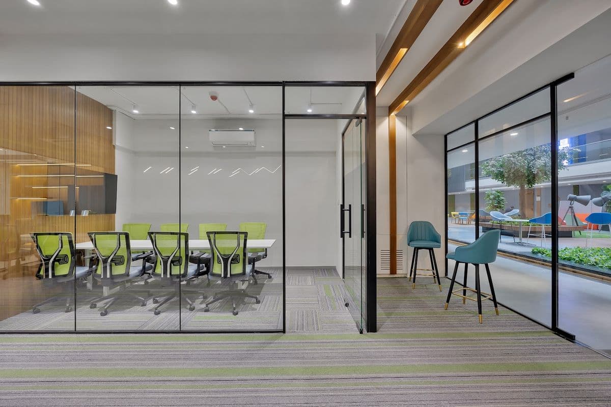 Glazed meeting room and timber cabin wall in a completed Cohuman fit-out